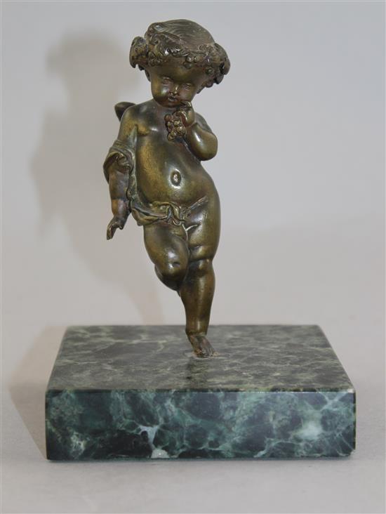 A Continental patinated bronze model of Cupid, 5.5in.